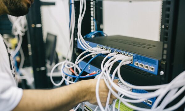 Man repairing server rack